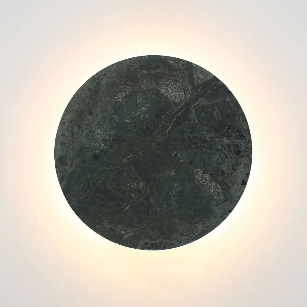 Round stone surface with natural texture on a gradient background