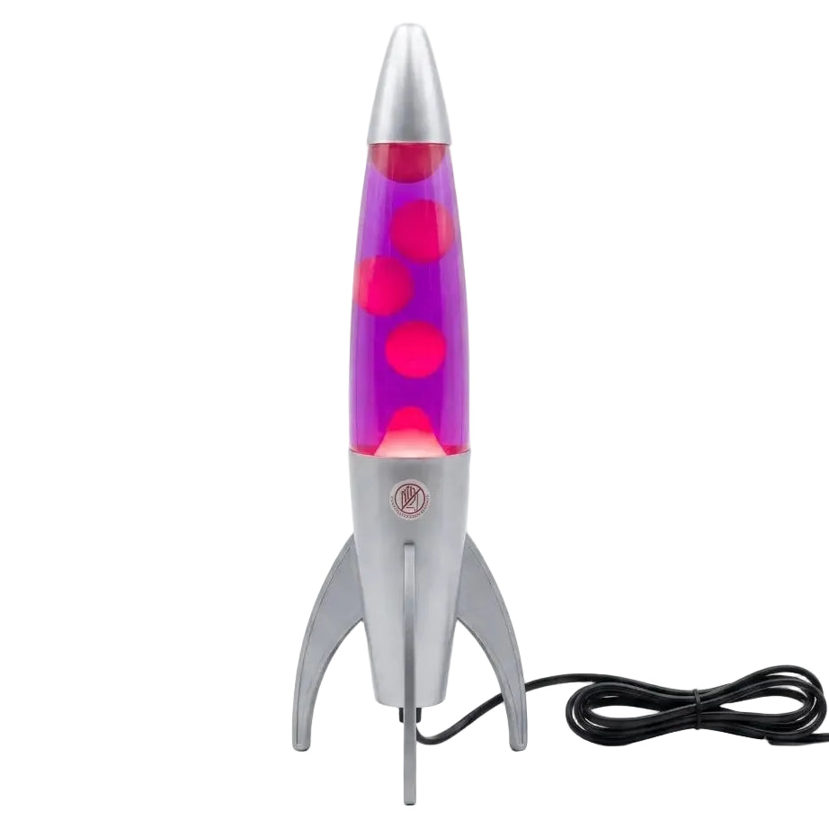 A retro-style rocket-shaped lava lamp with a metallic silver body and three legs, featuring a purple glass chamber filled with pink wax and glowing pink bubbles, shown on a white background with its black power cord.