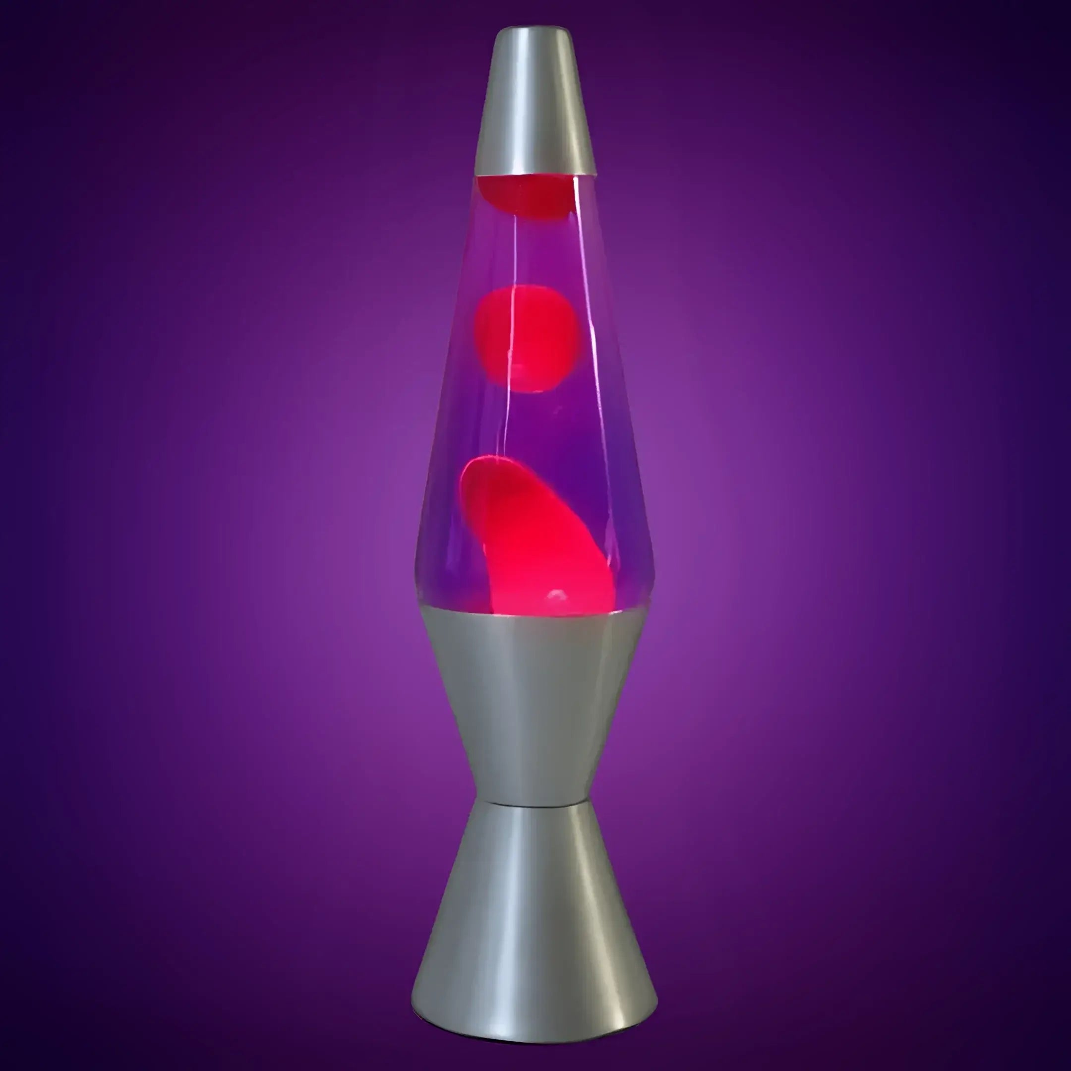 Purple red lava lamp with red wax and purple liquid in a silver vintage lava lamp base and neck for colourful decor