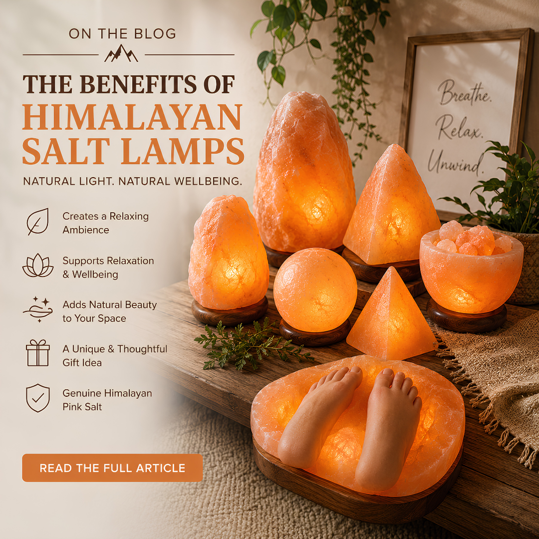 Himalayan salt lamps glowing with warm amber light, including natural, pyramid, sphere and firebowl styles, with a Himalayan salt foot lamp in a relaxing home wellness setting.