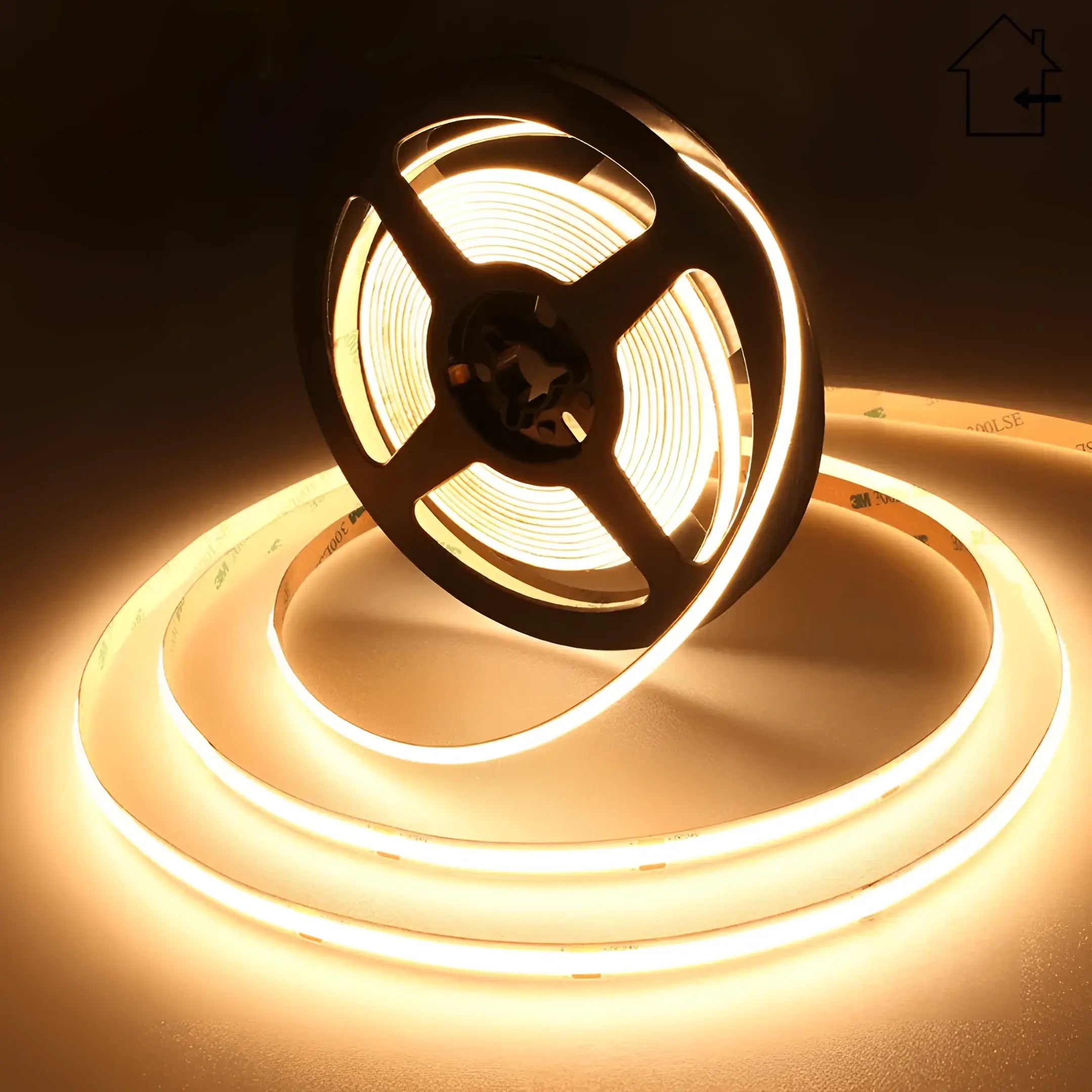Warm white 3000k dotless cob led strip light roll with black backing and silver metal connector for indoor use