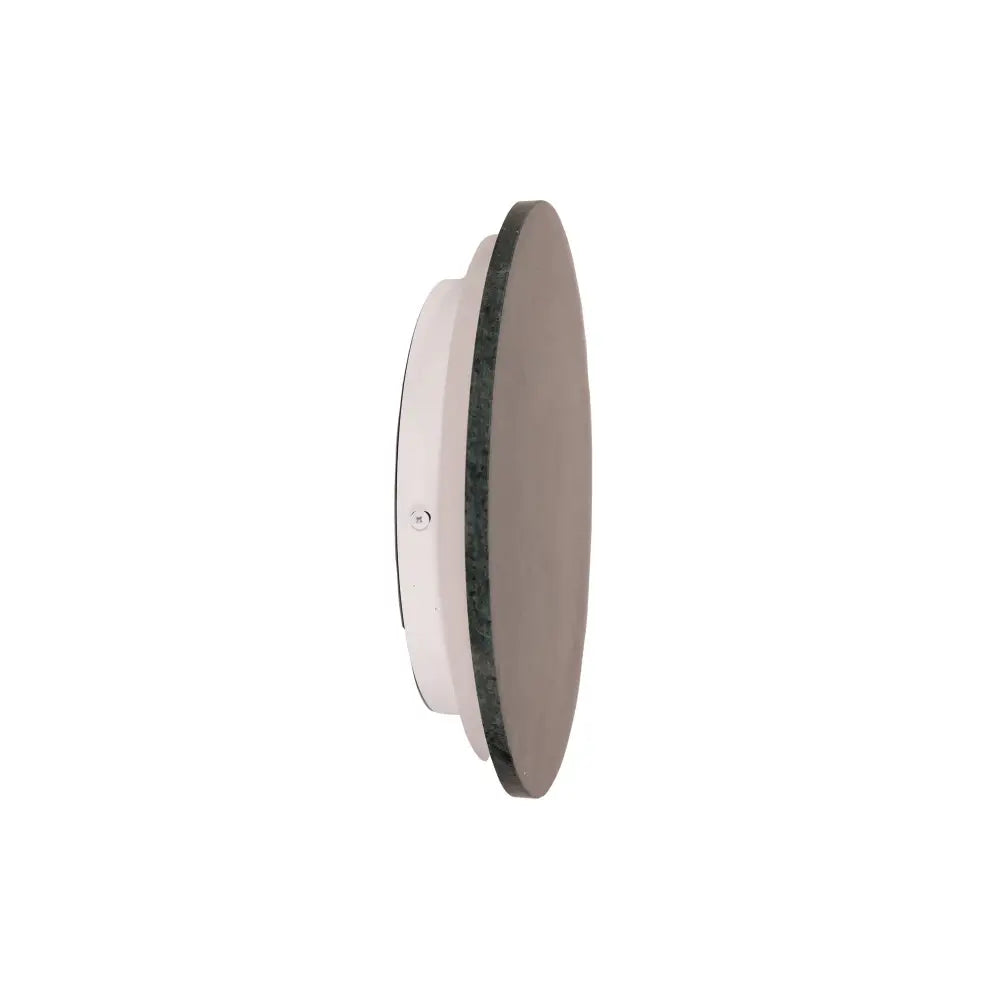 Round white object with a dark gray circular component on a white background