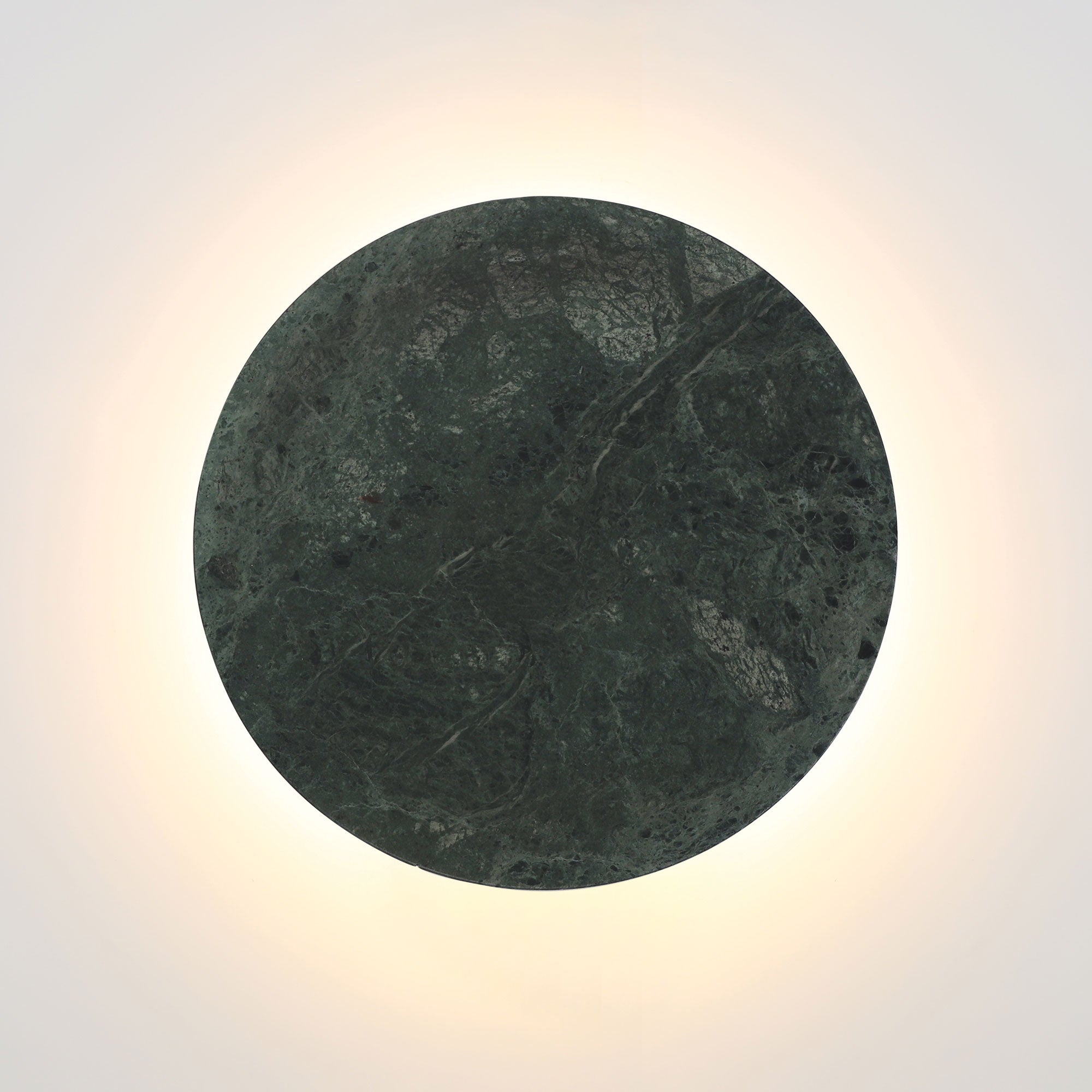 Round stone surface with natural texture on a gradient background