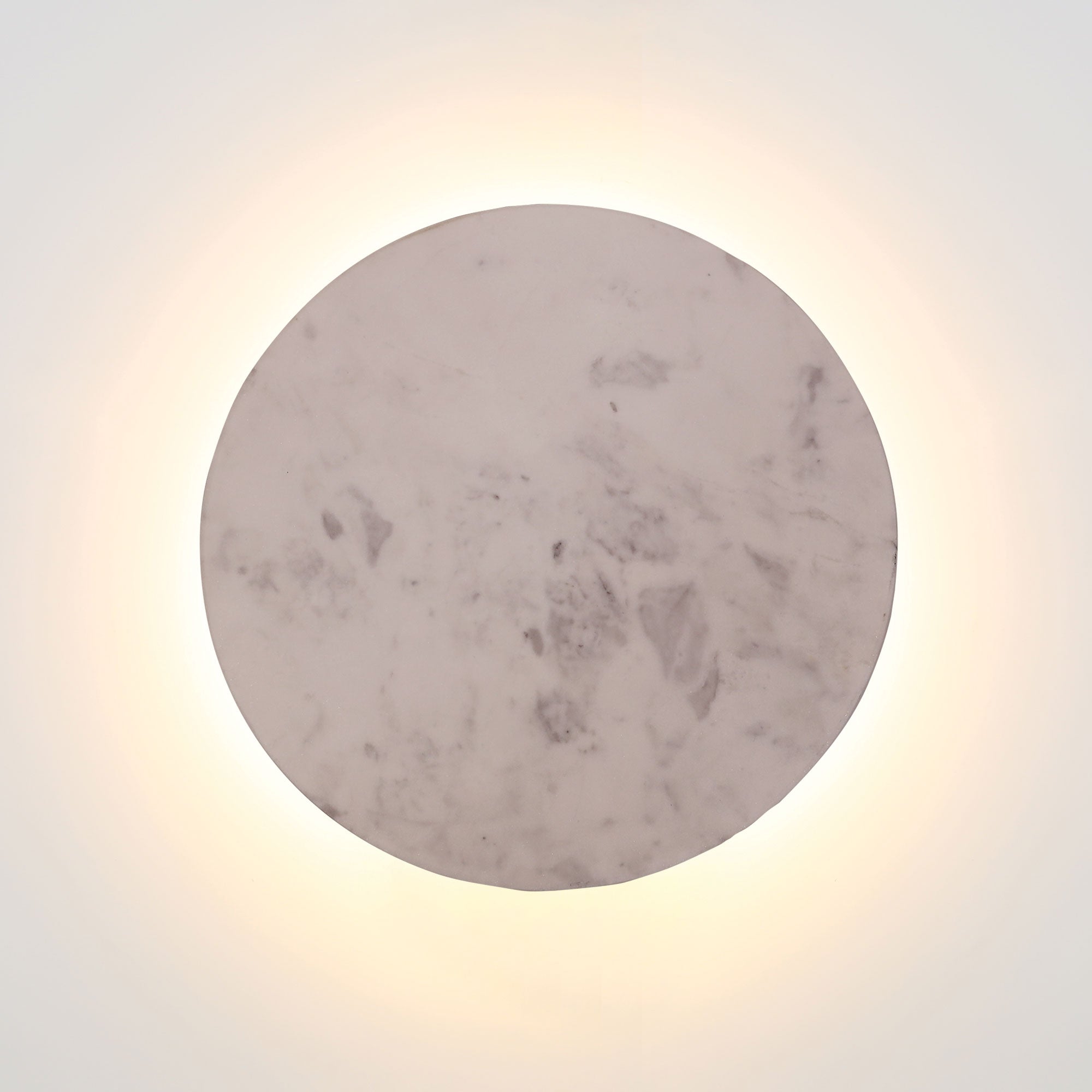 Round marble surface with a light background. Dot 25 grey