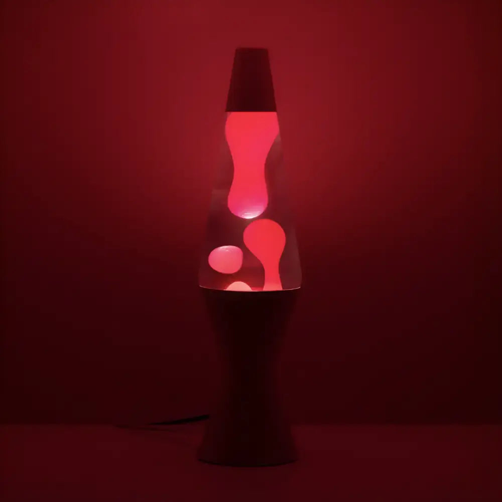 Pink pastel lava lamp featuring clear liquid and moving pink lava, available at greenearth.net.au.