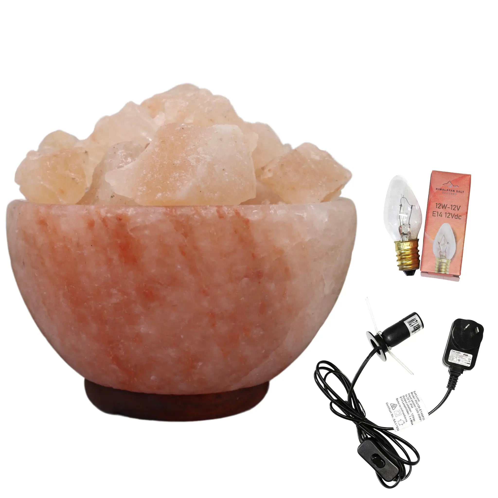 Fire bowl Himalayan salt lamp with bulb, adapter, and cable on a white background