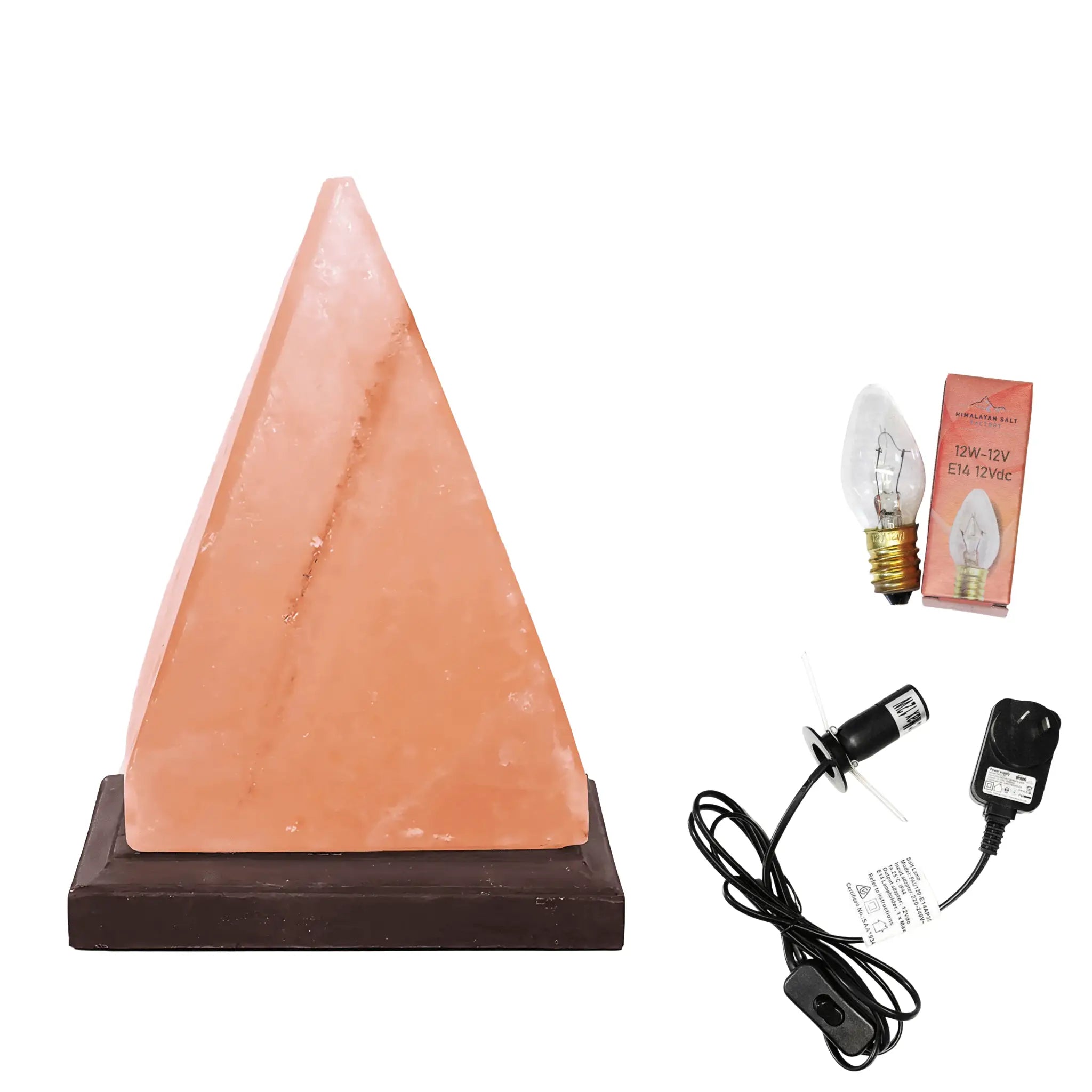 Himalayan salt lamp with bulb, adapter, and packaging on a white background