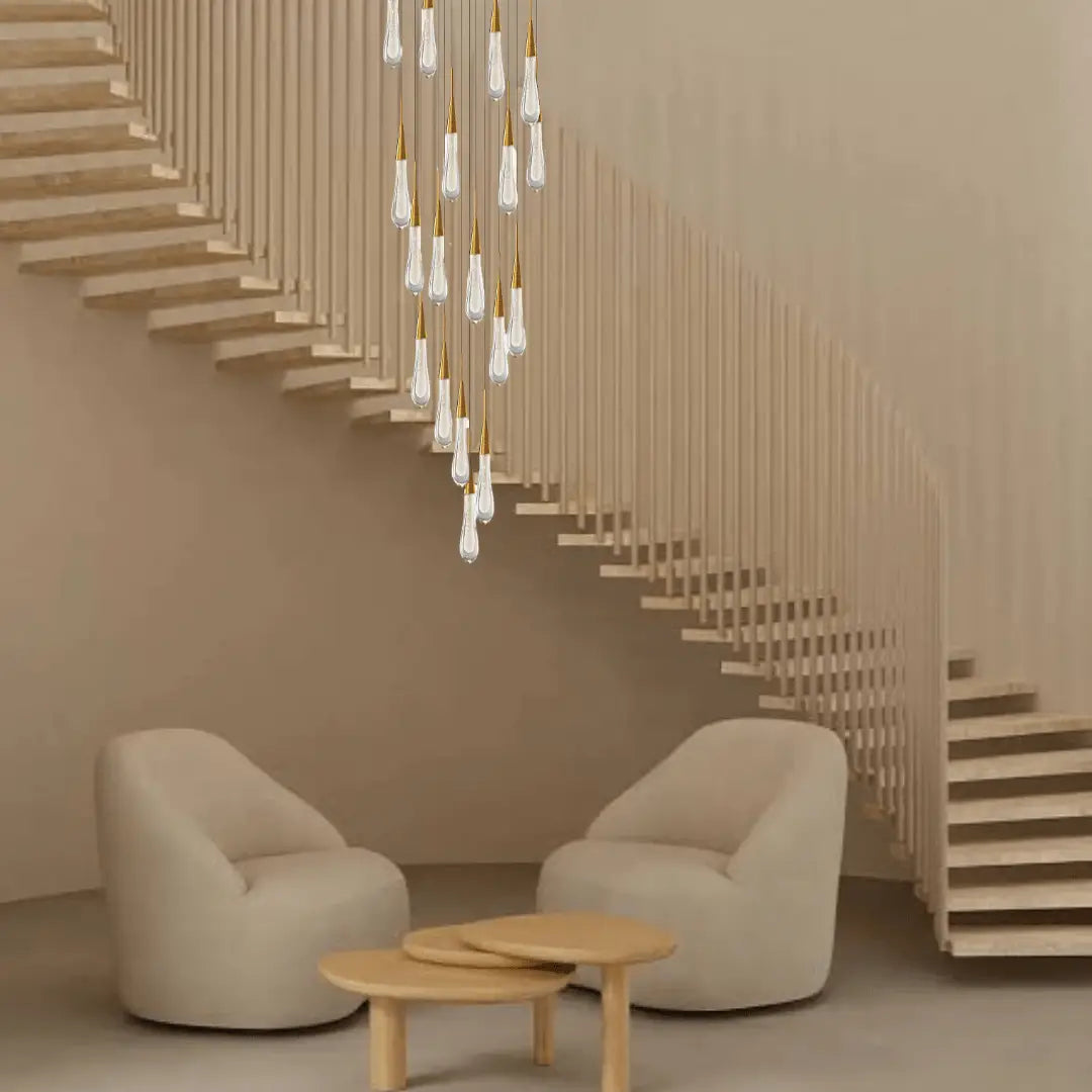 A virelle gold crystal chandelier pendant light 23-light with cascading crystal droplets design in a neutral-toned interior