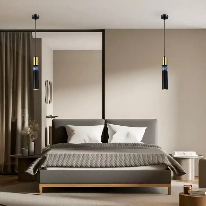 Modern bedroom with a gray bed and pendant lights. Roma Matt Black & Brass LED Tri-Colour Single Pendant Light